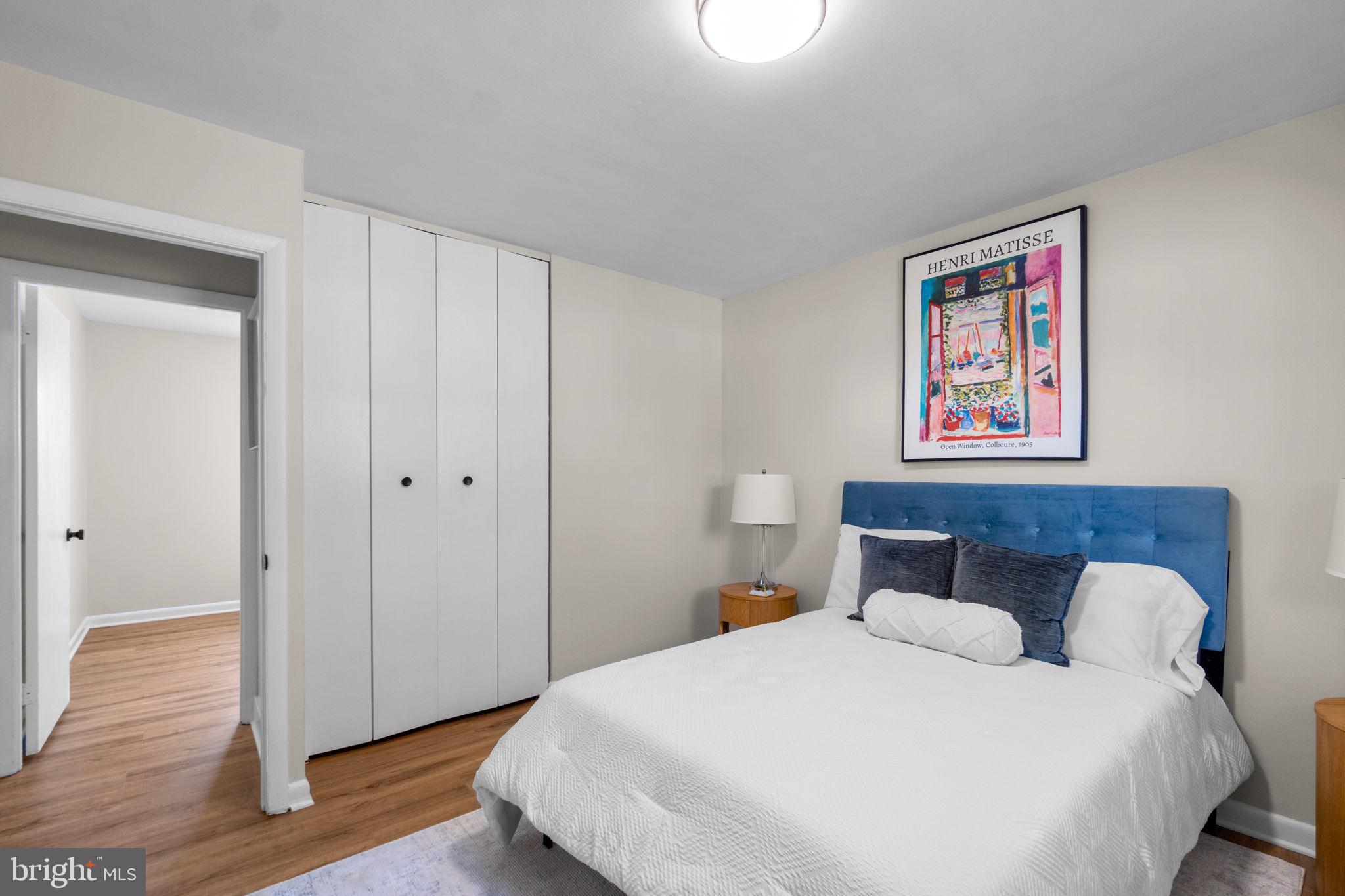 1012 Dunholme Road Reisterstown, MD 21136 - Photo 18 of 30 a bedroom with a large bed and wooden floor