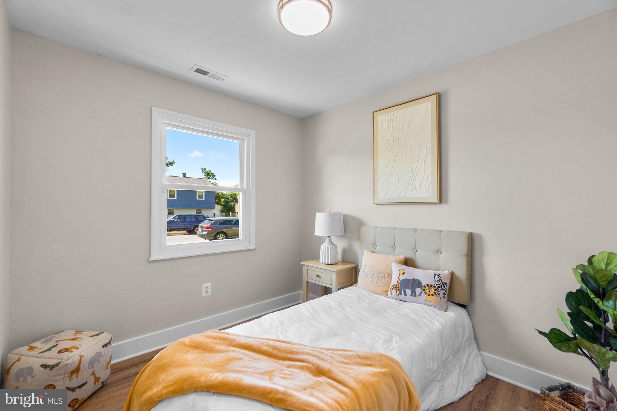 1012 Dunholme Road Reisterstown, MD 21136 - Photo 21 of 30 a bedroom with a bed and a window