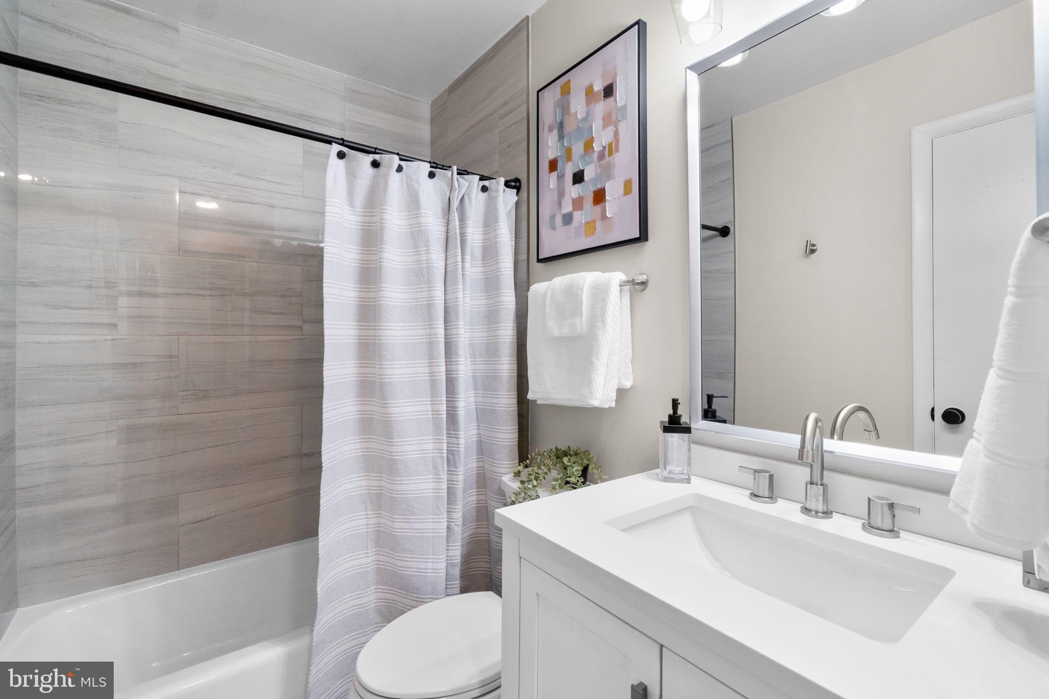 1012 Dunholme Road Reisterstown, MD 21136 - Photo 25 of 30 a bathroom with a sink toilet and shower