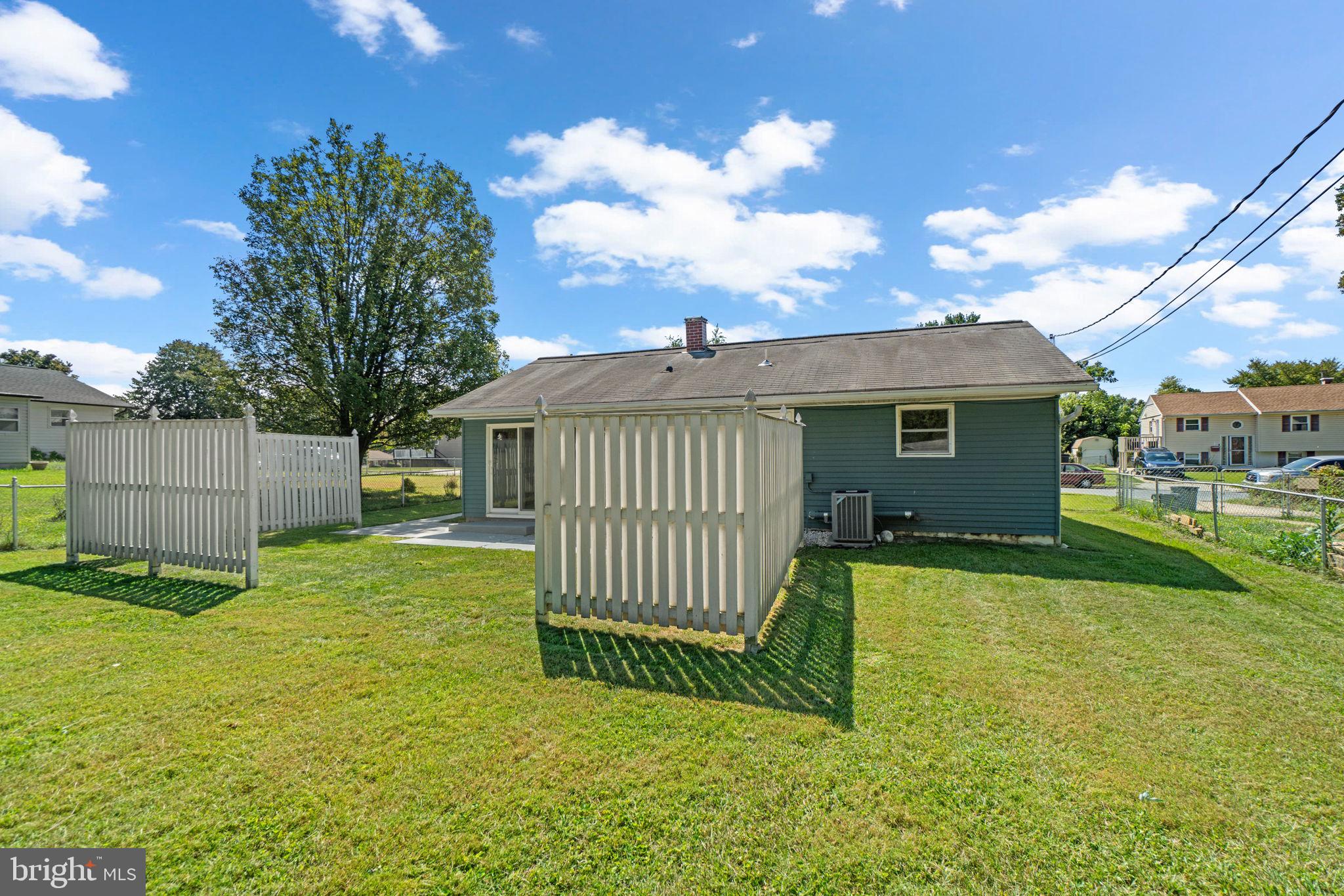 1012 Dunholme Road Reisterstown, MD 21136 - Photo 30 of 30 a view of a house with a yard and a garden