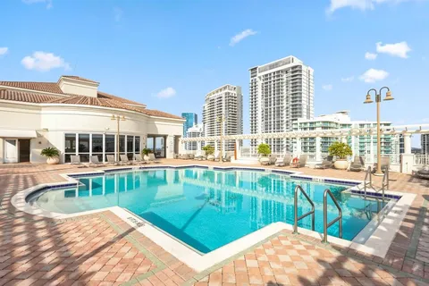 a view of a swimming pool and a chairs