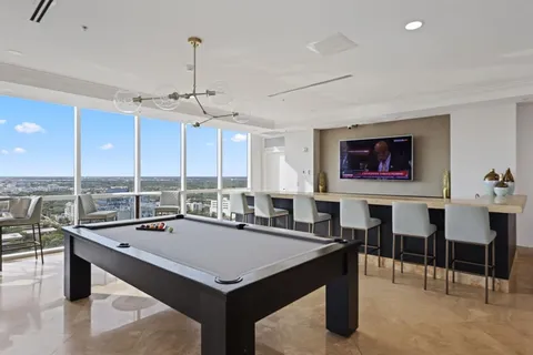 a view of a utility room with wooden walls