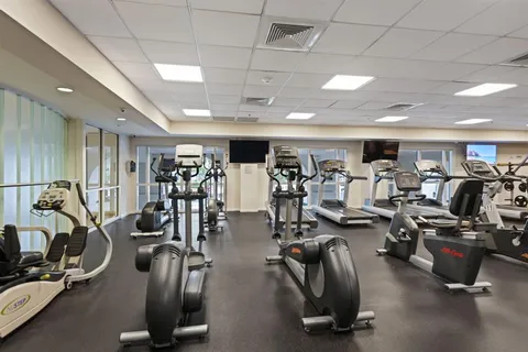 a view of a house with fountain