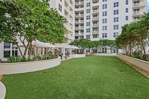 a view of a hall with dining room
