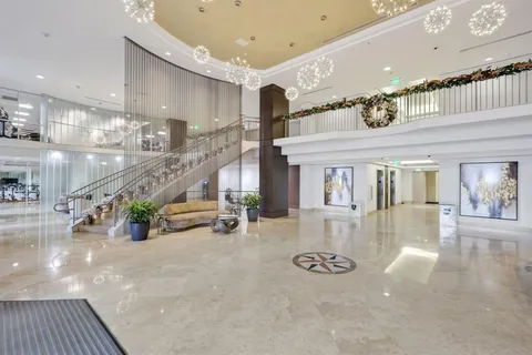 a view of a city with tall buildings