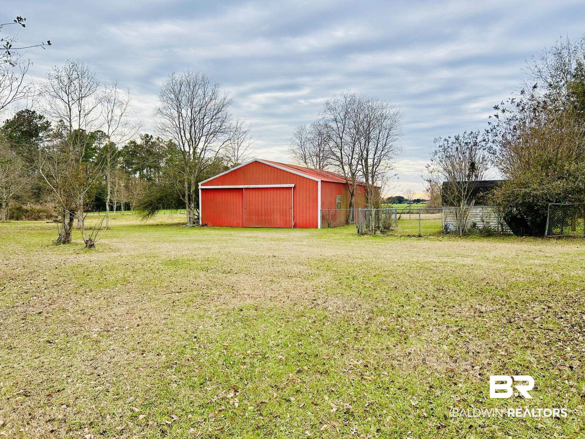 13551 Gaston Loop Road Grand Bay, AL 36541 - Photo 8 of 15 View of yard featuring an outdoor structure