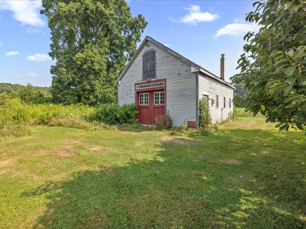 439 Lower Road Hardwick, MA 01031 - Photo 26 of 41 a front view of house with yard and green space