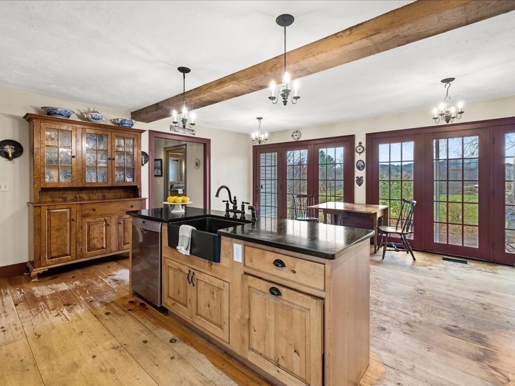 439 Lower Road Hardwick, MA 01031 - Photo 5 of 41 a kitchen with stainless steel appliances granite countertop a stove and cabinets