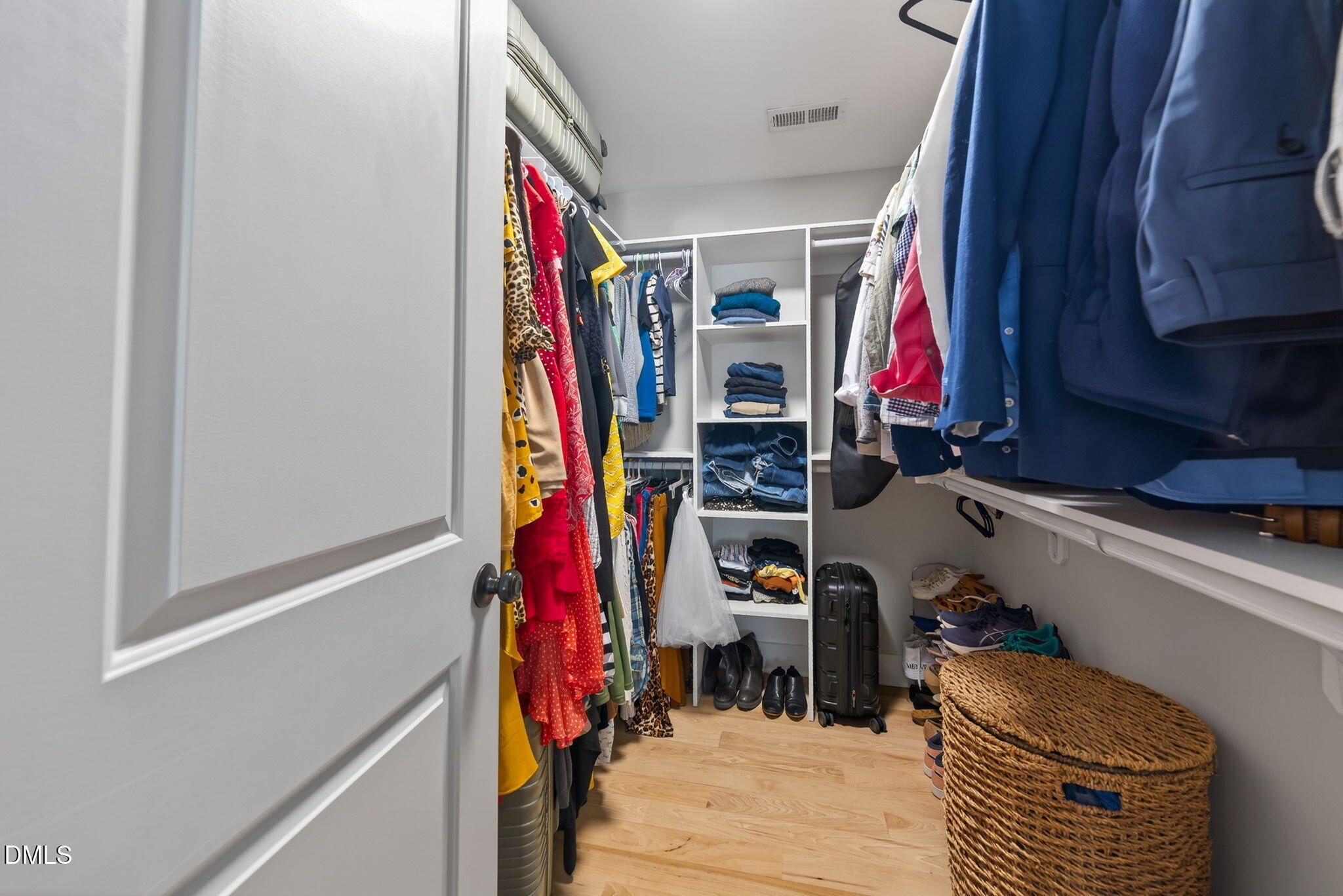 213 Lincoln Court Raleigh, NC 27610 - Photo 26 of 40 a view of walk in closet with clothes