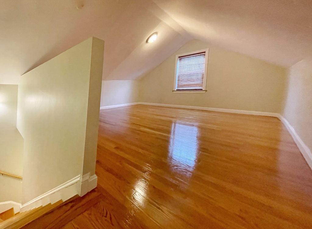 88-90 George Street Boston, MA 02119 - Photo 13 of 15 a view of a hallway with wooden floor