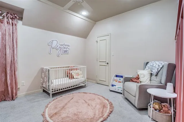 a bedroom with furniture and a wooden floor