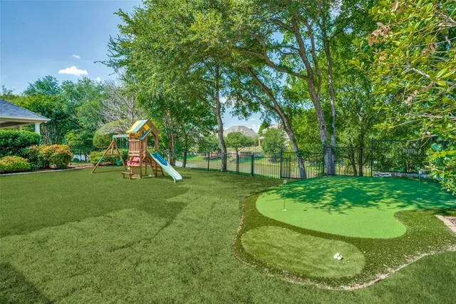 a view of a garden with a slide