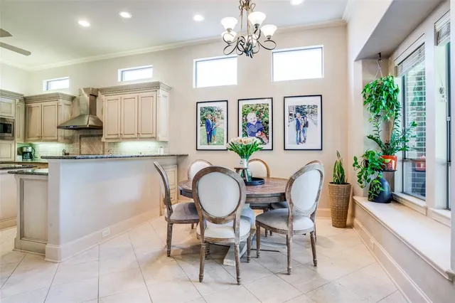 a dining room with furniture a livingroom with furniture and window
