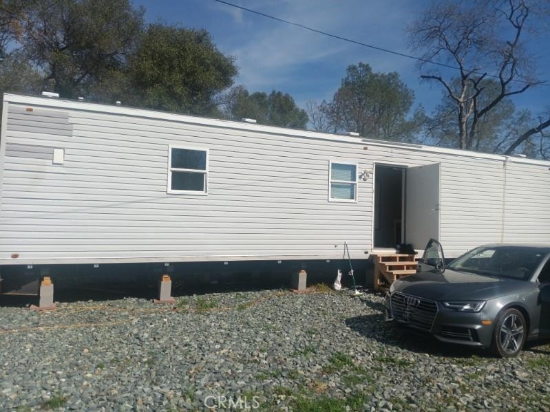 a side view of a house with a patio
