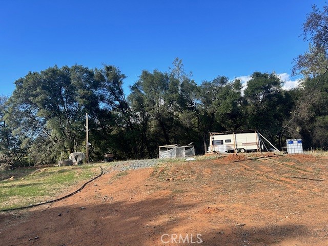 1403 Forbestown Road Oroville, CA 95966 - Photo 6 of 26 a view of a house with a snow on the road