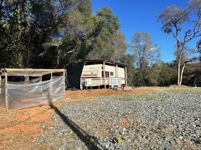 1403 Forbestown Road Oroville, CA 95966 - Photo 7 of 26 a view of a backyard with table and chairs