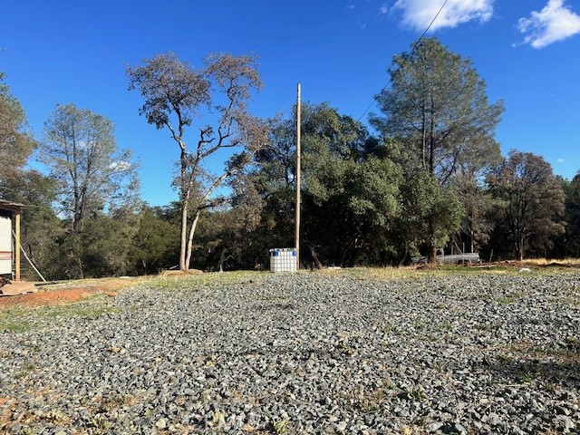1403 Forbestown Road Oroville, CA 95966 - Photo 8 of 26 a pathway of a house with a yard