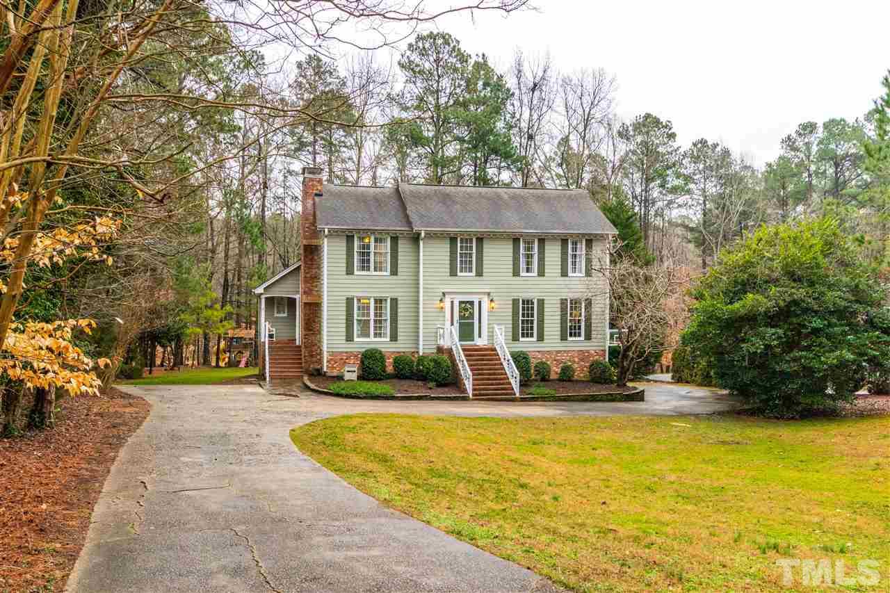 9908 Waterview Road Raleigh, NC 27615 - Photo 1 of 30 a front view of a building with garden