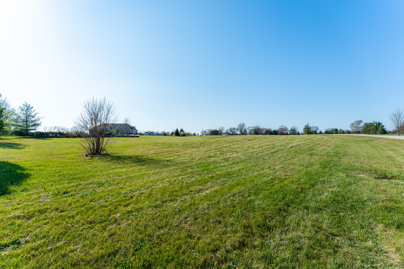 Lot 4 Trail Ridge Dr Street St. Charles, IL 60175 - Photo 7 of 10 a view of a lake with a big yard