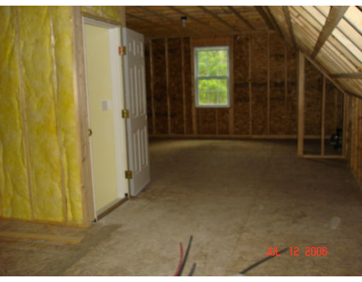 971 Lincoln Road Oakham, MA 01068 - Photo 13 of 13 a view of empty room with windows
