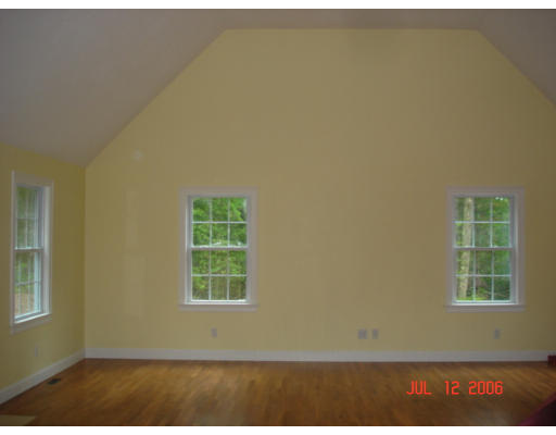 971 Lincoln Road Oakham, MA 01068 - Photo 5 of 13 a view of an empty room and window
