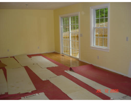 971 Lincoln Road Oakham, MA 01068 - Photo 8 of 13 a view of an empty room with a window