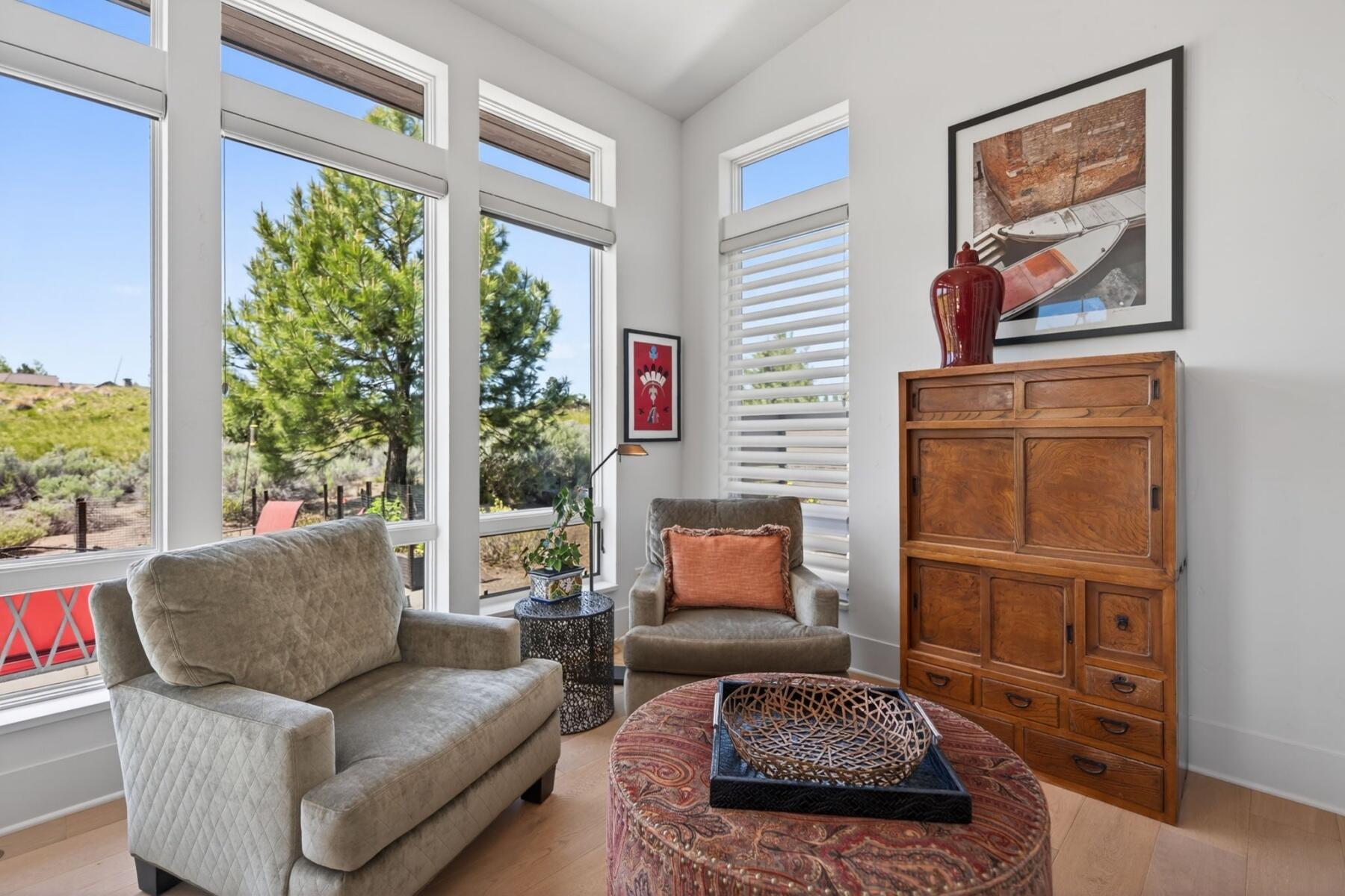 61487 Hackleman Court Bend, OR 97702 - Photo 16 of 35 a living room with furniture and a window