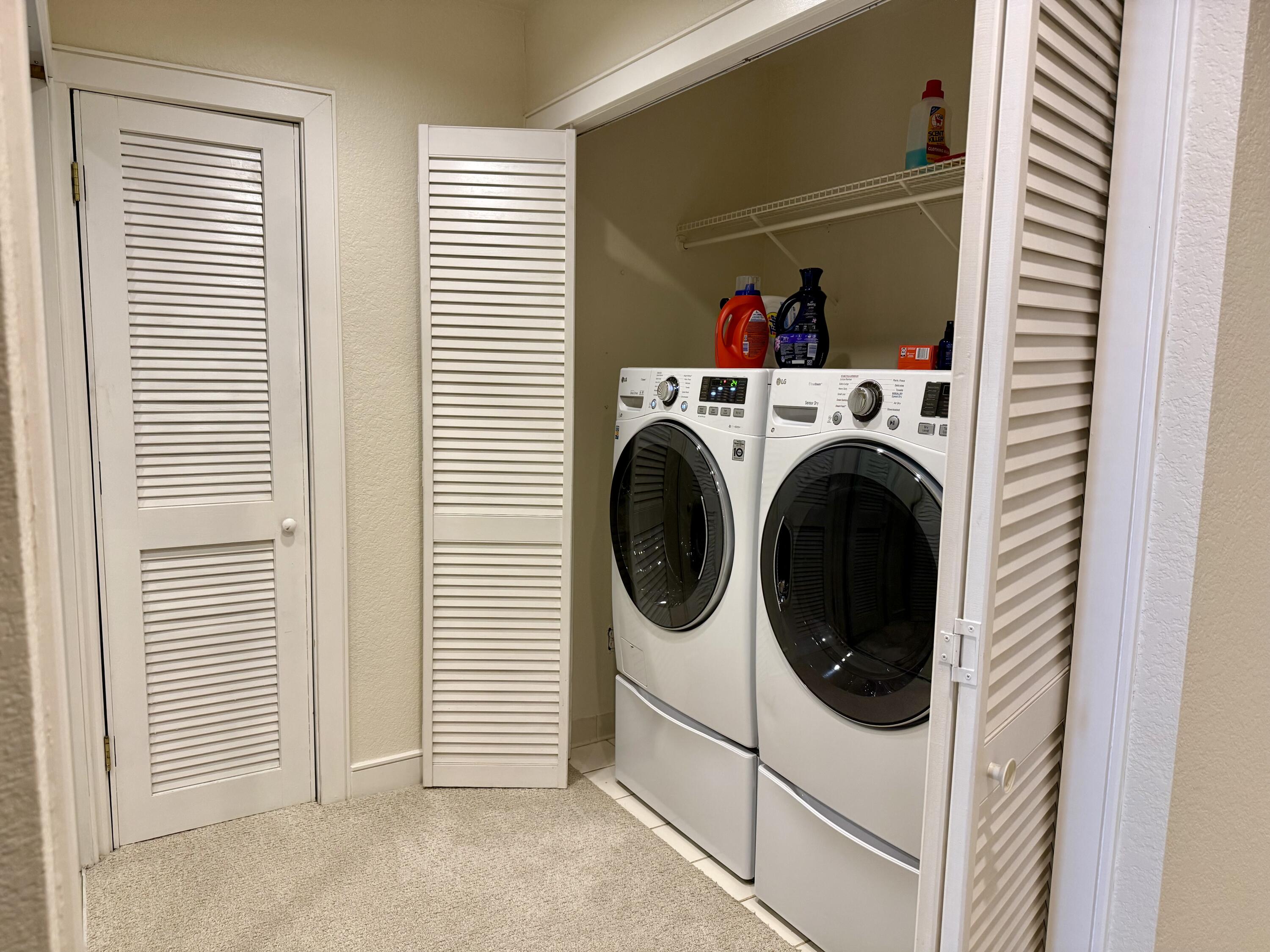 4406 15th Street Lubbock, TX 79416 - Photo 32 of 61 a utility room with dryer and washer