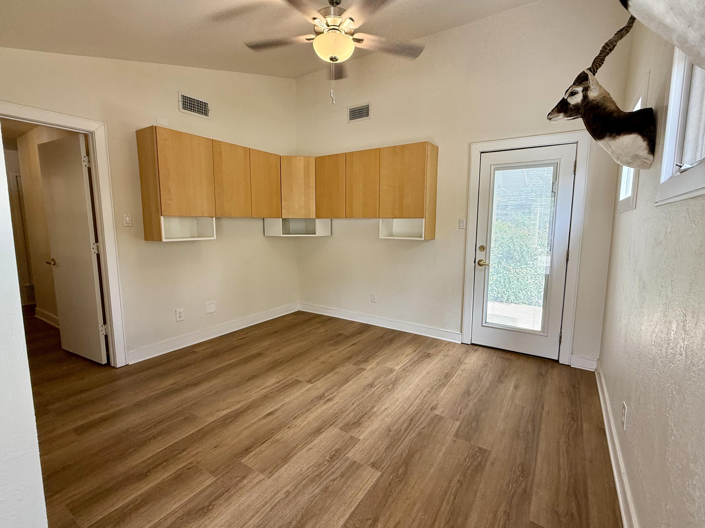 4406 15th Street Lubbock, TX 79416 - Photo 45 of 61 a view of a livingroom with wooden floor