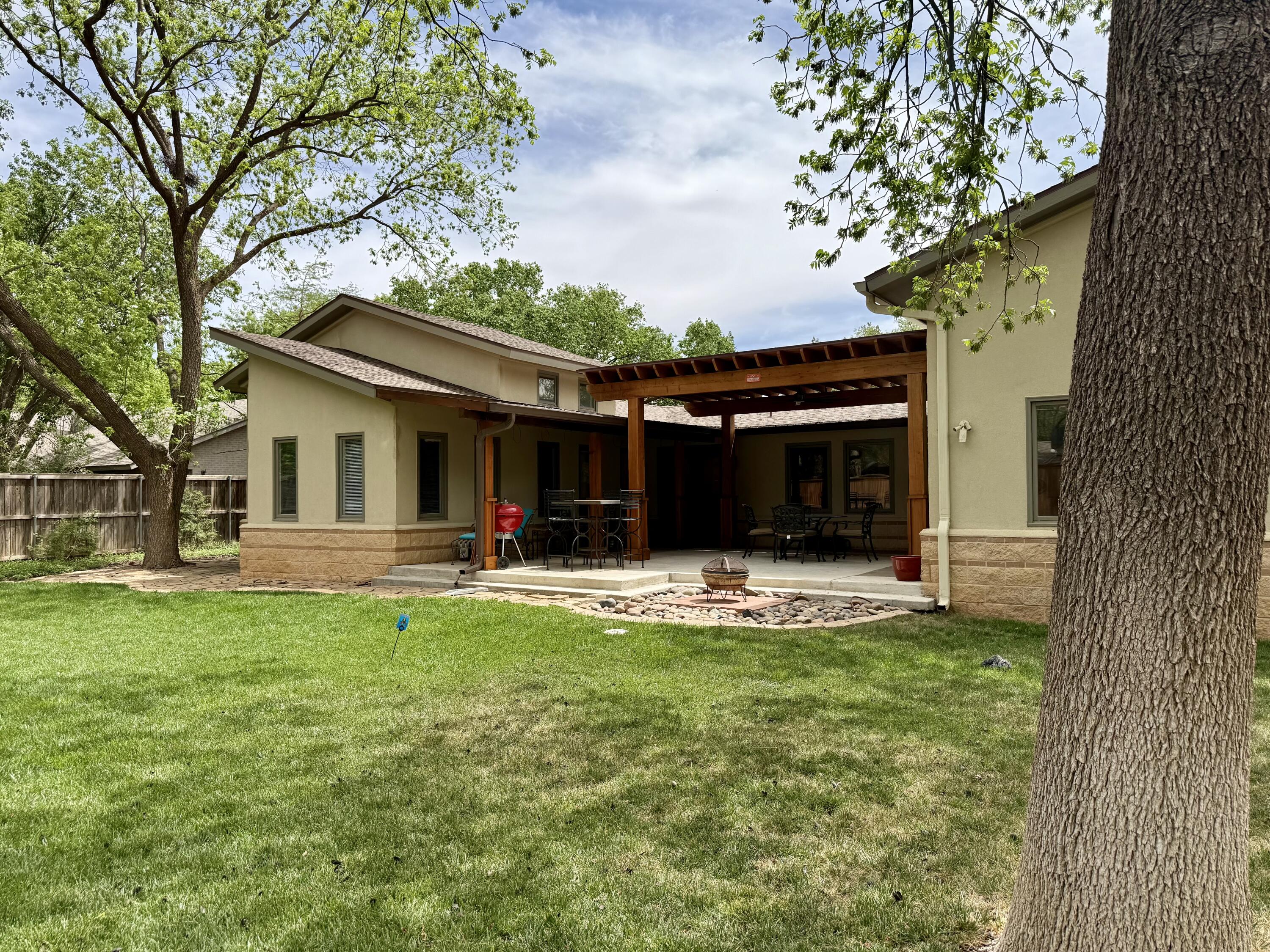 4406 15th Street Lubbock, TX 79416 - Photo 50 of 61 a view of a house with backyard and sitting area
