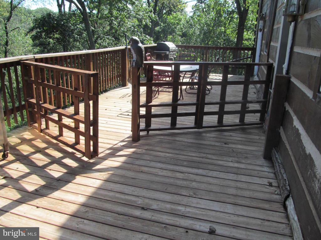 126 Mail Rte Road Sinking Spring, PA 19608 - Photo 8 of 22 a view of balcony with wooden floor and outdoor seating