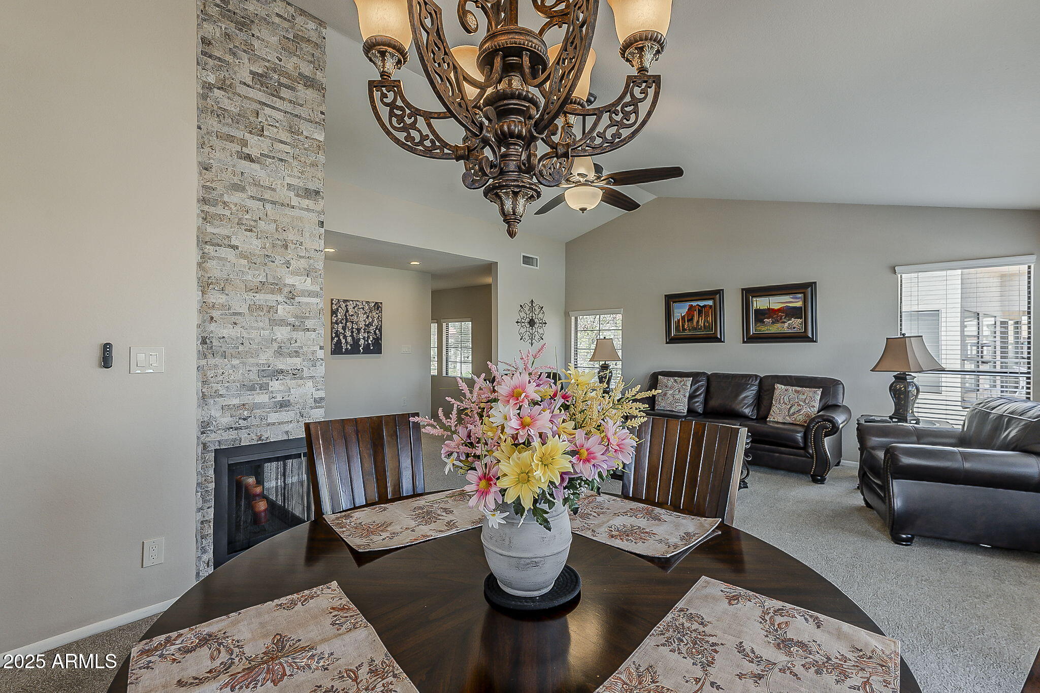 9707 East Mountain View Road, Unit 2412 Scottsdale, AZ 85258 - Photo 13 of 43 a living room with furniture and flower pot