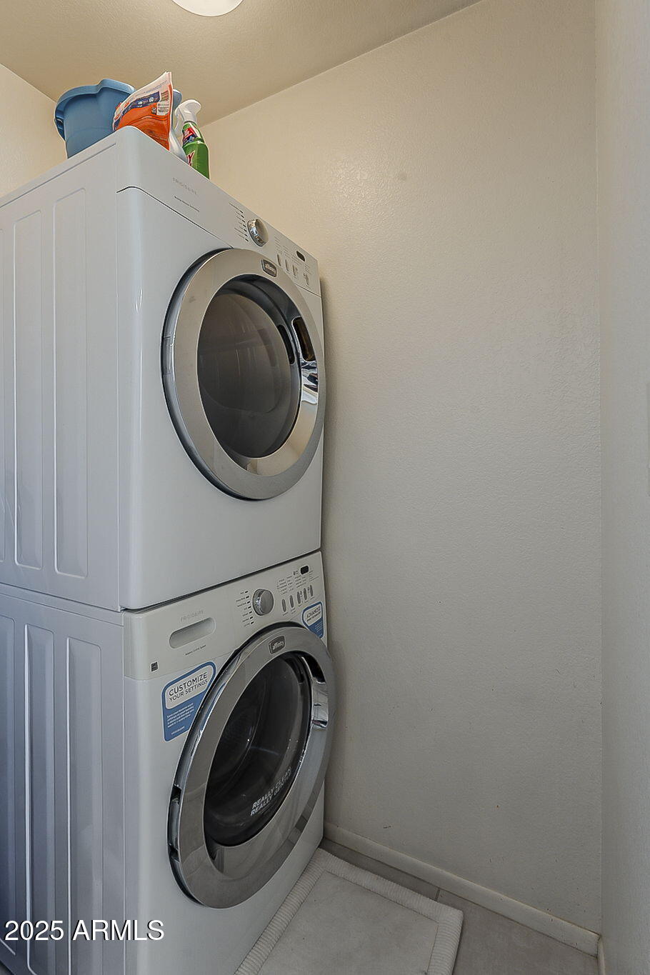 9707 East Mountain View Road, Unit 2412 Scottsdale, AZ 85258 - Photo 20 of 43 a utility room with dryer and washer