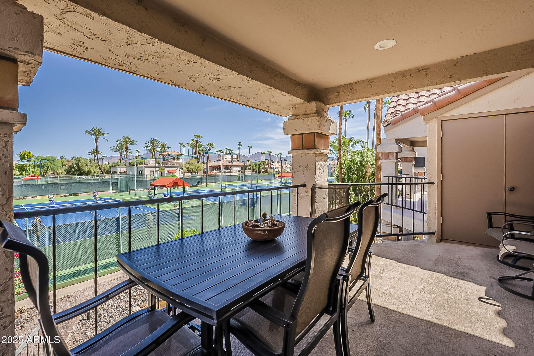 9707 East Mountain View Road, Unit 2412 Scottsdale, AZ 85258 - Photo 33 of 43 a view of a dining room with furniture window and outside view