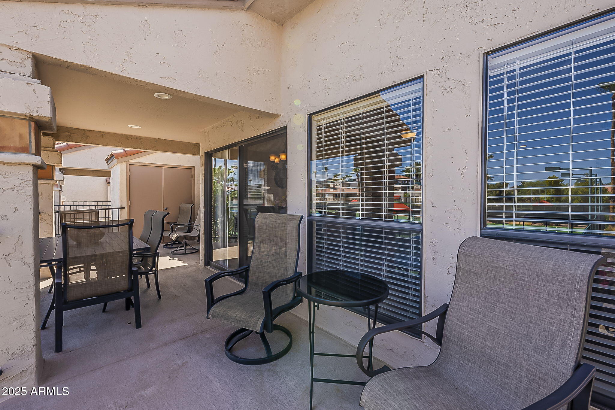 9707 East Mountain View Road, Unit 2412 Scottsdale, AZ 85258 - Photo 37 of 43 a view of a livingroom with furniture and a window