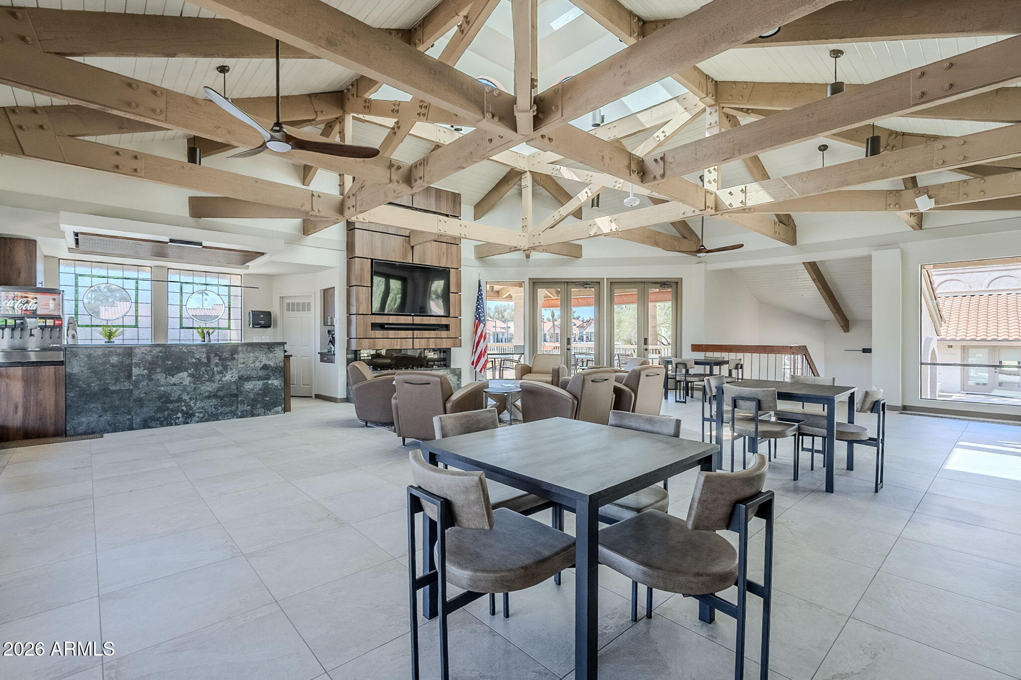 9707 East Mountain View Road, Unit 2412 Scottsdale, AZ 85258 - Photo 55 of 61 a view of a dining room with furniture window and wooden floor