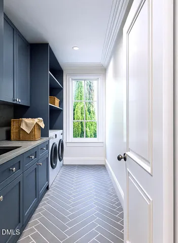 a view of a kitchen with a sink dishwasher and a refrigerator