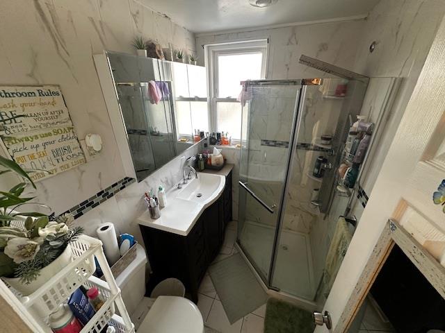 2335 Hermany Avenue Bronx, NY 10473 - Photo 15 of 23 a bathroom with a sink toilet and shower
