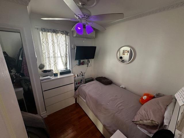 2335 Hermany Avenue Bronx, NY 10473 - Photo 17 of 23 a bedroom with a bed and a flat screen tv