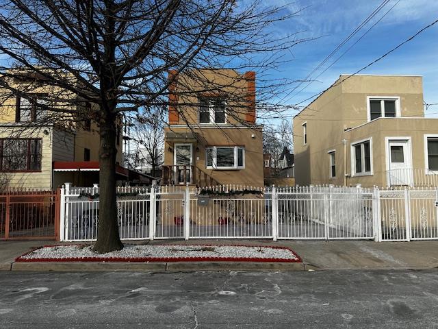 2335 Hermany Avenue Bronx, NY 10473 - Photo 22 of 23 a front view of a building with street