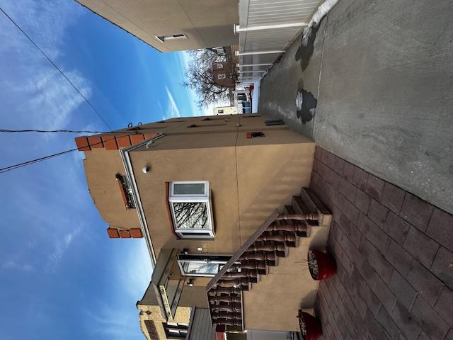 2335 Hermany Avenue Bronx, NY 10473 - Photo 4 of 23 a view of a street with stairs