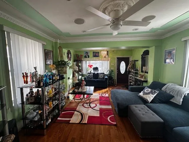 a living room with lots of furniture and a flat screen tv