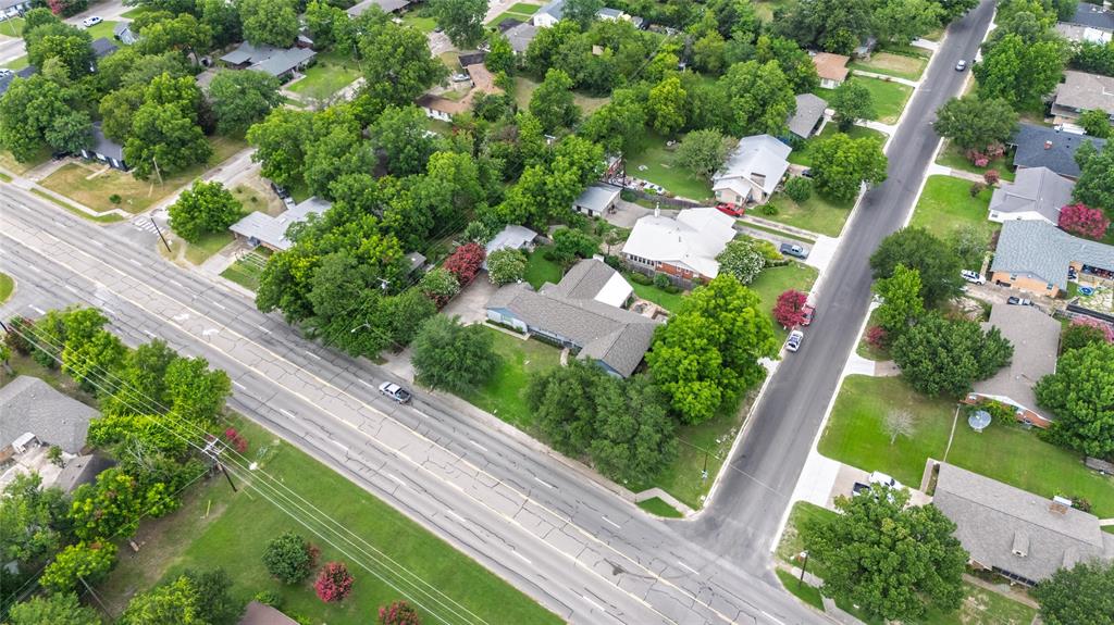 1302 Culver Street Commerce, TX 75428 - Photo 40 of 40 a view of a yard with potted plants