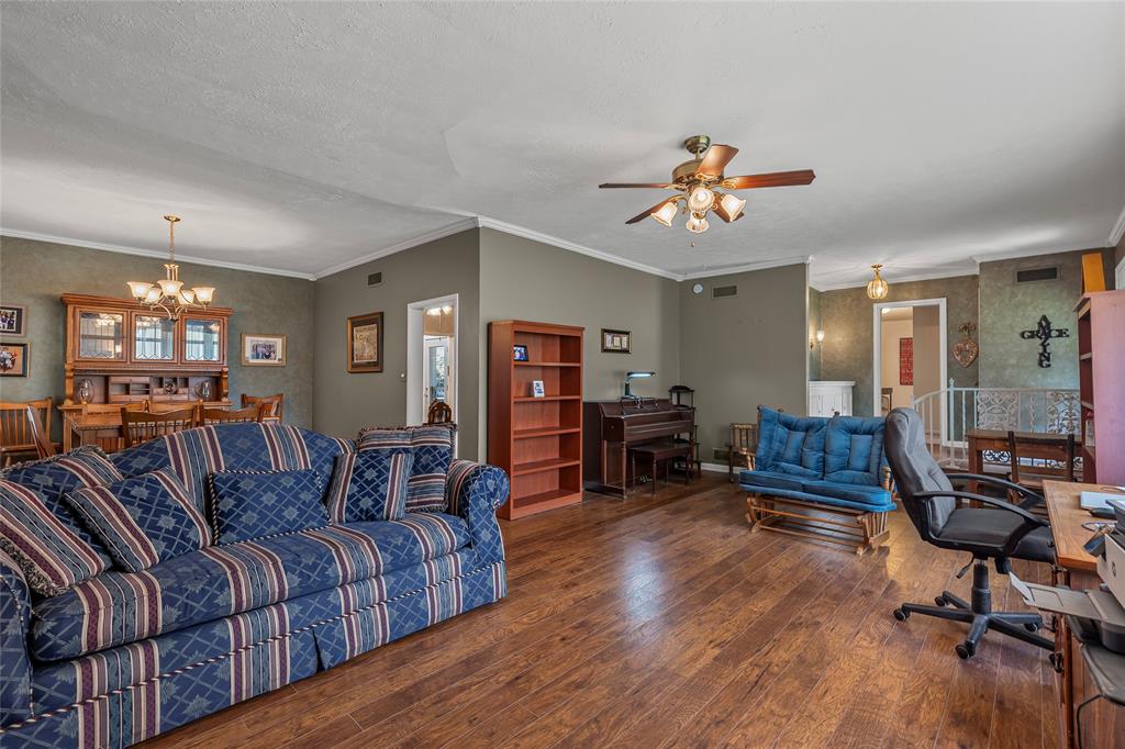 1302 Culver Street Commerce, TX 75428 - Photo 9 of 40 a living room with furniture