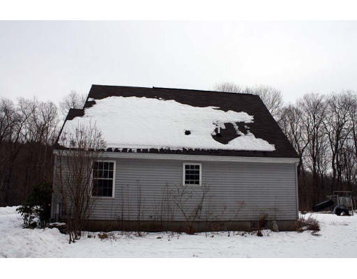 125 Conway Road Whately, MA 01039 - Photo 4 of 16 a front view of a house with a yard
