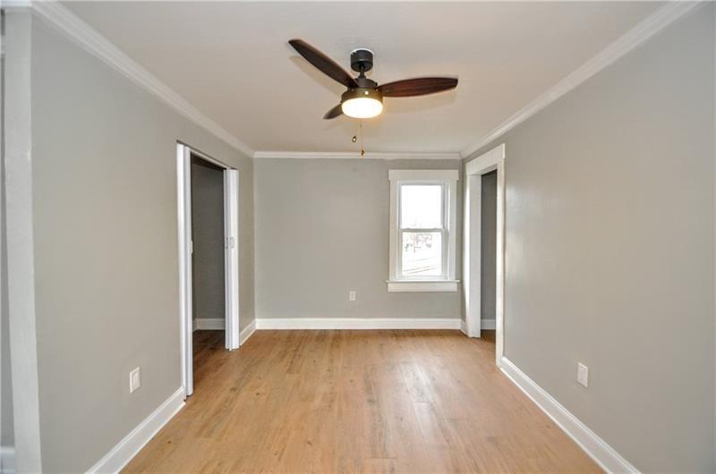 145 East Main Street Monongahela, PA 15063 - Photo 18 of 27 wooden floor in an empty room with a window