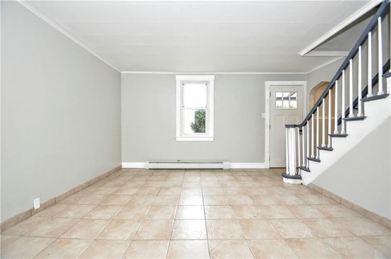 145 East Main Street Monongahela, PA 15063 - Photo 6 of 27 a view of an empty room with stairs