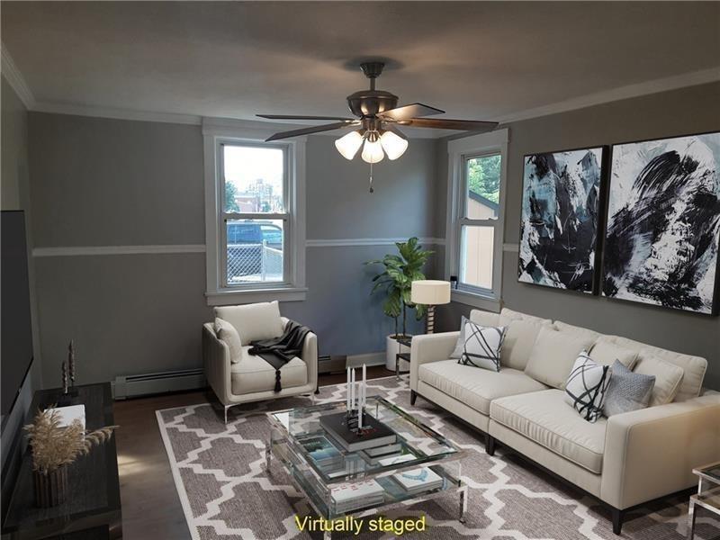 145 East Main Street Monongahela, PA 15063 - Photo 7 of 27 a living room with furniture and a large window