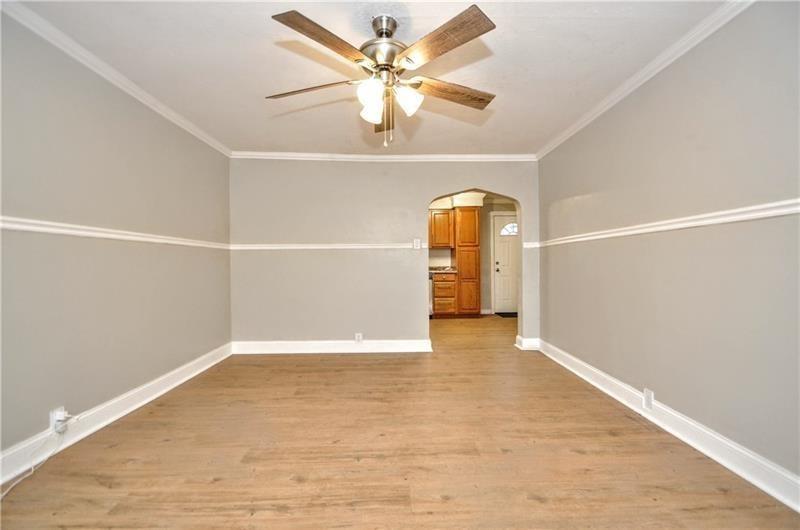 145 East Main Street Monongahela, PA 15063 - Photo 8 of 27 wooden floor in an empty room with a window