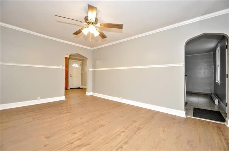 145 East Main Street Monongahela, PA 15063 - Photo 9 of 27 a view of an empty room with a ceiling fan
